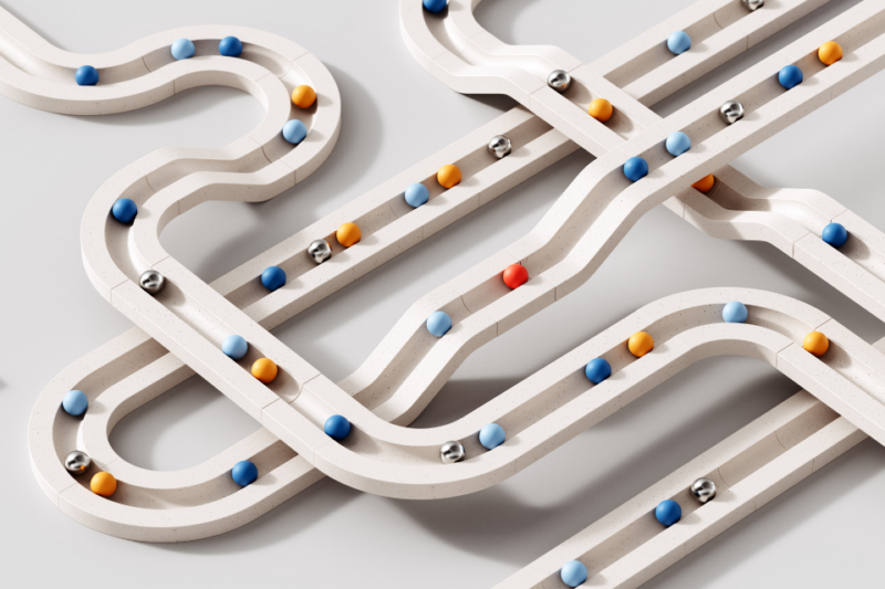 Marbles on criss-crossing tracks